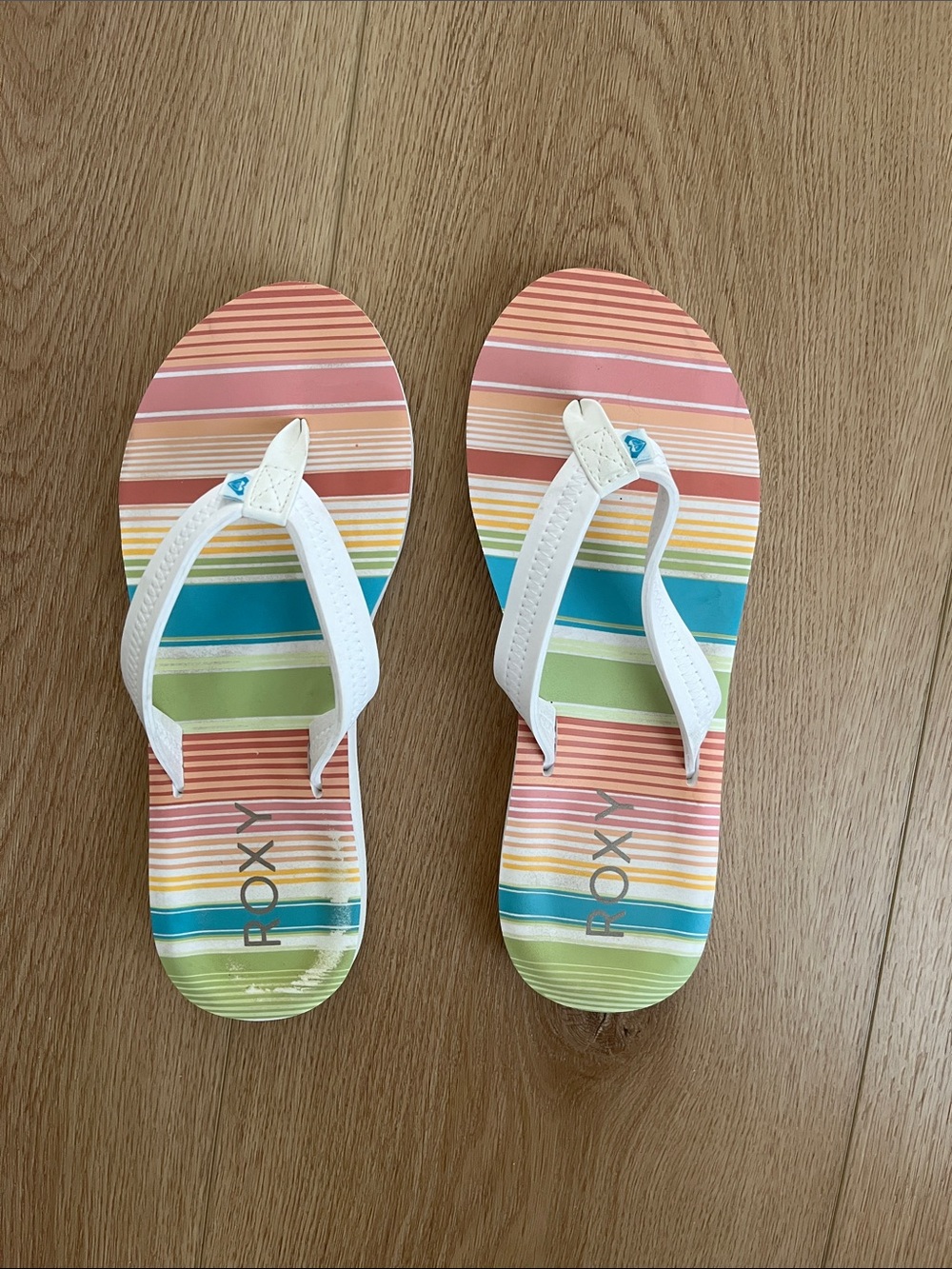 Roxy women’s  Stripe Flip Flops in White with Multicolor Stripes
